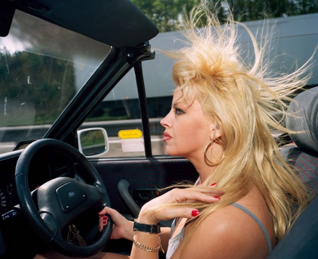 GB. England. 'I feel that other women on the road react to me in a nasty hostile sort of way. For some reason this hate comes across. I mean, I give way to them so why don't they give way to me'. From 'A to B'. This image was used as the front cover of 'From A to B' 1994.